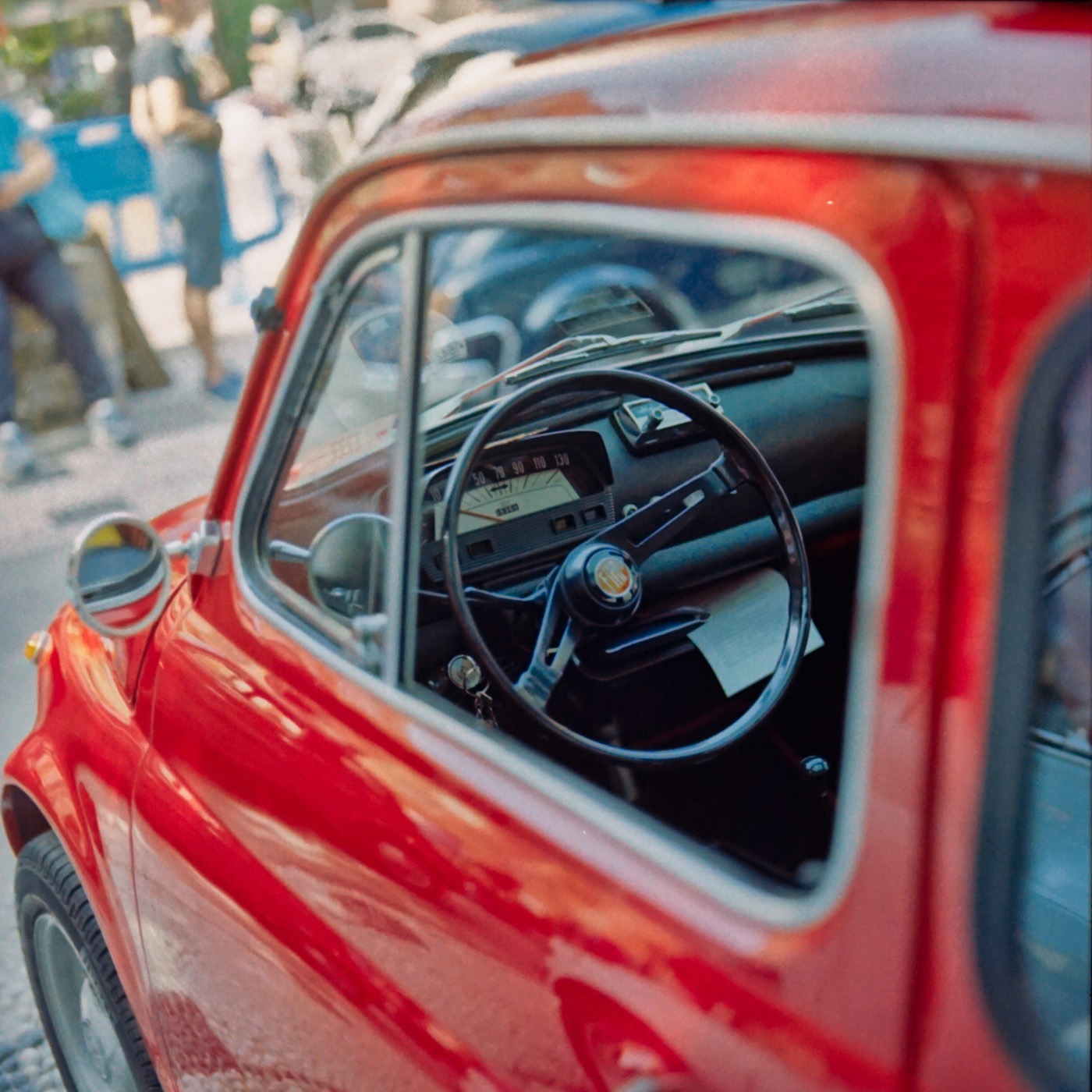 A red Fiat Cinquecento